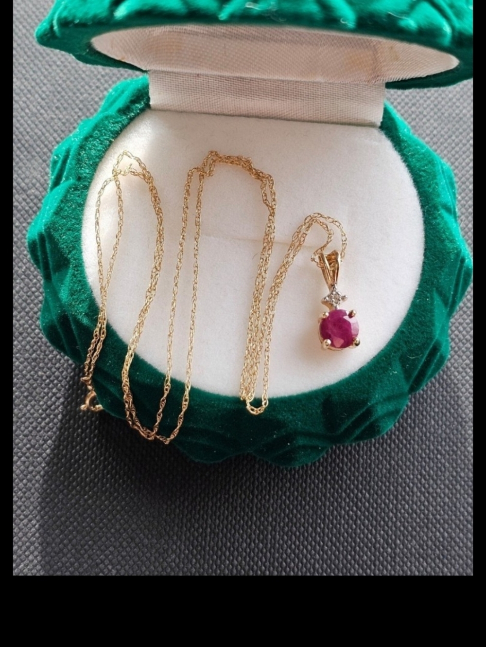 10k ruby & diamond necklace. Stamped 10k on the back of the pendant and on the c